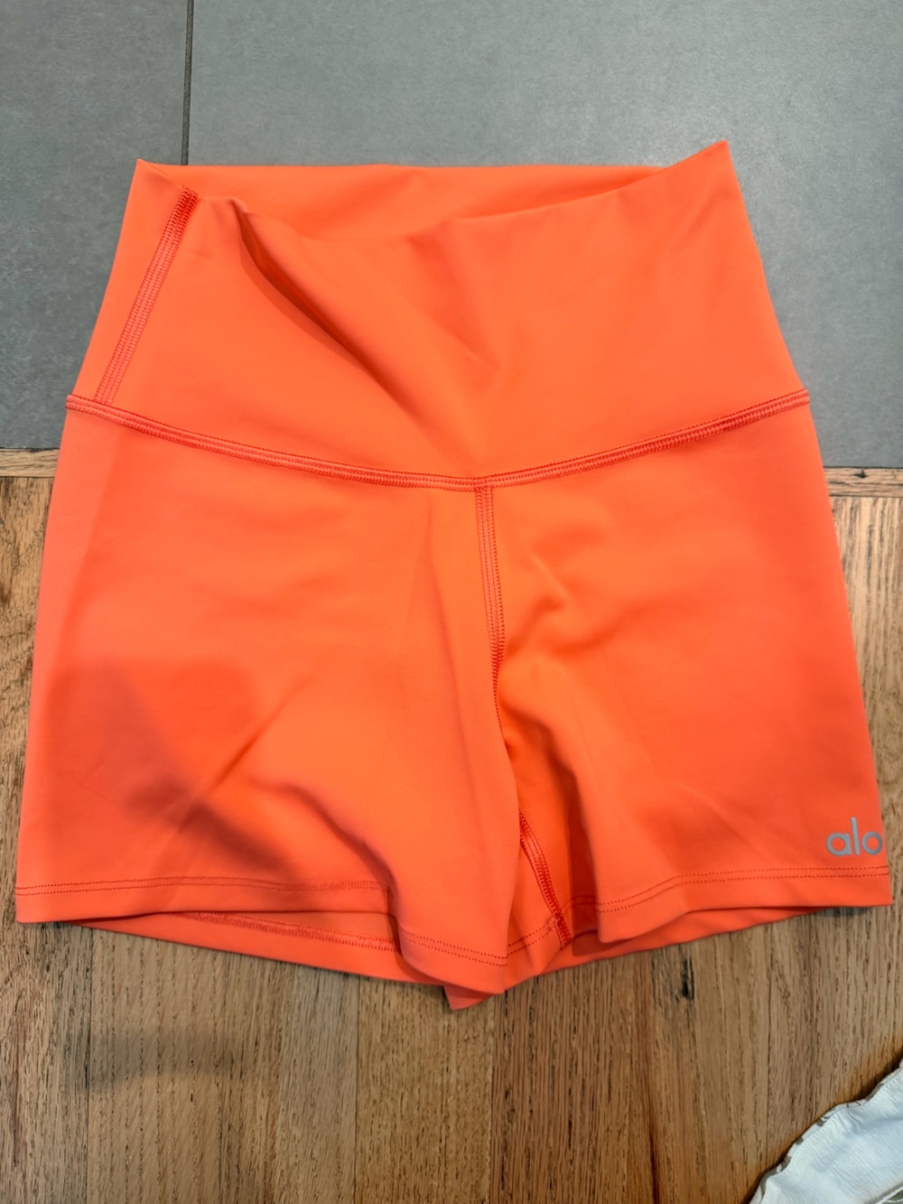 ALO Yoga Bright Orange High-Waist Bike Shorts